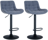 Set di 2 sgabelli da bar Tover in tessuto blu, eleganti e confortevoli, ideali per arredare con stile ogni ambiente.