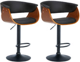Set di 2 sgabelli da bar Vestal in legno e pelle sintetica, design elegante in color walnuss e nero.