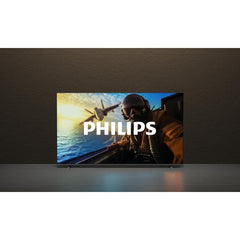 PHILIPS 36540 - PHILIPS 55PUS7000/12 in esposizione su parete scura, TV 55'' UHD ideale per home cinema e intrattenimento domestico.