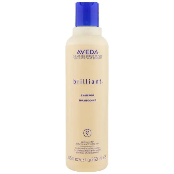 Flacone da 250ml di Aveda Brilliant Shampoo con tappo blu, ideale per la cura quotidiana dei capelli secchi e trattati. Shampoo professionale idratante.