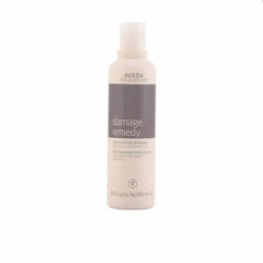 Aveda Damage Remedy Restructuring Shampoo 250ml New per capelli danneggiati, flacone beige con etichetta grigia. Shampoo ristrutturante professionale.