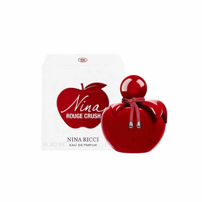 Flacone rosso a forma di mela del profumo Nina Ricci Nina Rouge Crush Eau De Parfum Spray 30ml con confezione bianca decorata. Profumo femminile elegante.
