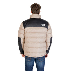 Retro del giubbotto uomo The North Face beige e nero, design trapuntato per isolamento termico. Perfetto per abbigliamento outdoor invernale.